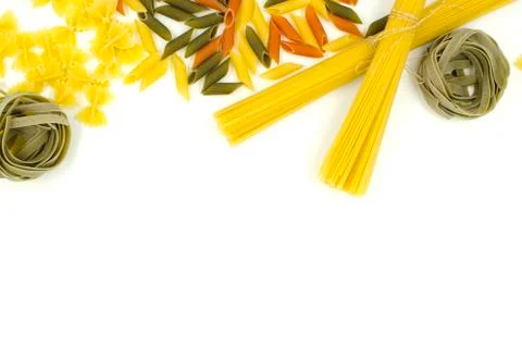 Uncooked pasta, spaghetti on white background Stock Photos