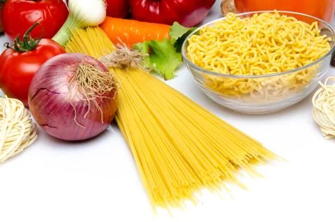 Uncooked pasta with vegetables 스톡 사진