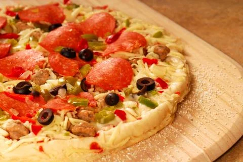 Uncooked pizza Stock Photos