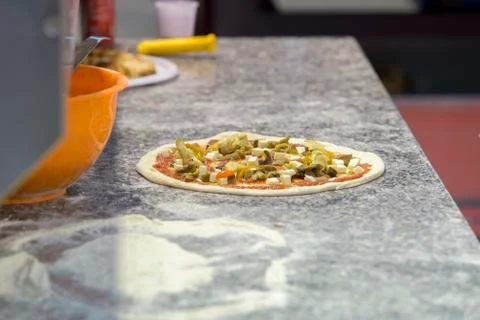 Uncooked pizza Stock Photos