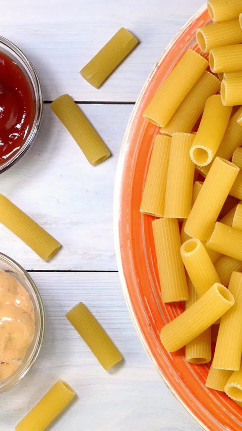 Uncooked raw italian rigatoni pasta Stock Video Pond5