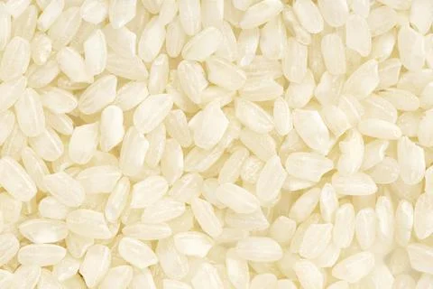 Uncooked rice background texture. Full frame Stock Photos