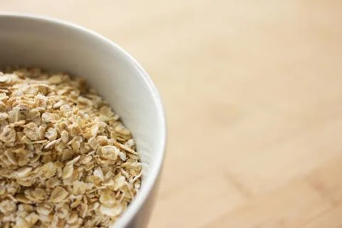 Uncooked rolled oats Stock Photos