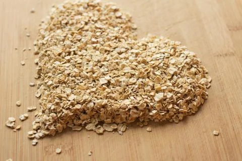Uncooked rolled oats Stock Photos