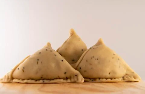 Uncooked samosa Stock Photos