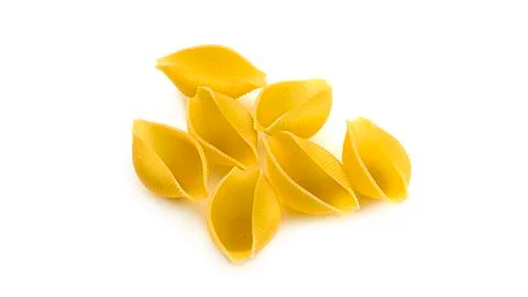 Uncooked shell pasta on white background. Foto stock