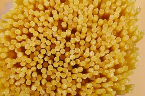 Uncooked spaghetti strands Stock Photos