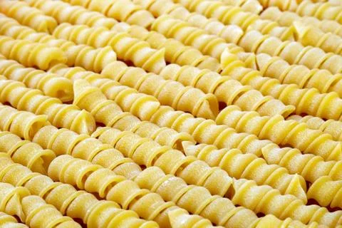 Uncooked spiral pasta Stock Photos