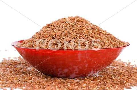 Uncooked thai brown rice in a bowl Stock Photos