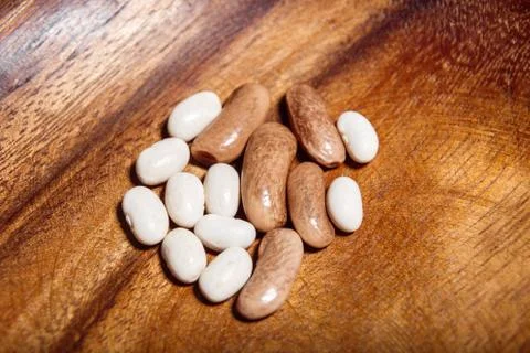 Uncooked white beans closeup macro Stock Photos