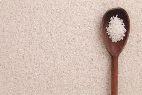 Uncooked white rice background Stock Photos