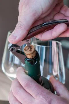 Uncork a bottle of wine Stock Photos
