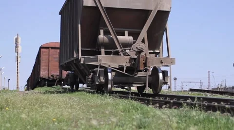 Uncoupling of wagons. Spring, flowers and green grass Vídeos de archivo 47066304