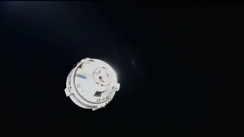 Uncrewed Boeing Starliner spacecraft performing series of breakout burns Stock Footage 284315915