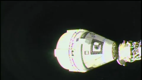 Uncrewed Boeing Starliner spacecraft undocking from Space Station Stock Footage 284315991