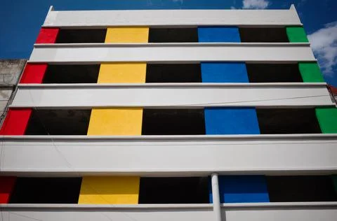 Undefined modern building with painted with different colors Fotos de archivo