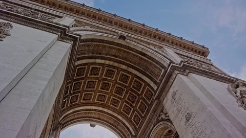 Under the Arc de Triomphe tilt up slow motion Stock Footage 124404085