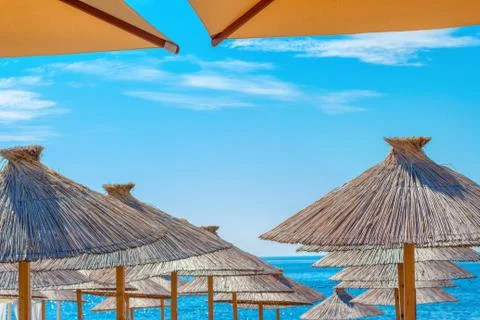 Under the beach umbrella Stock Photos