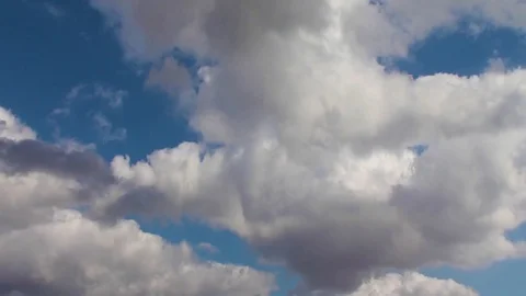 Under Beautiful Cumulus Clouds.  Time Lapse Stock Footage 76247790