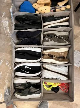 Under bed shoe storage Stock Photos
