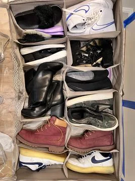 Under bed shoe storage Stock Photos