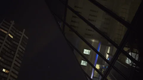 Under Black Skyscraper reflection with glass windows at business district in Stock-Footage 119367765