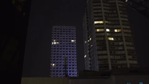 Under Black Skyscraper reflection with glass windows at business district in Stock Footage 119368333