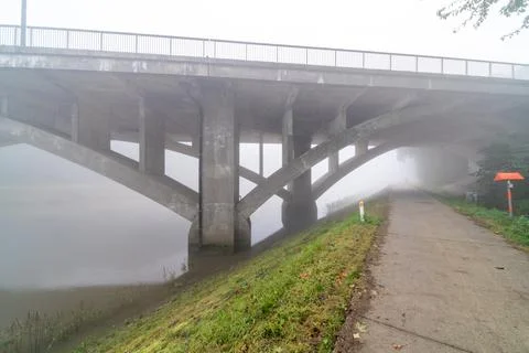 Under the bridge with fog Stock Photos