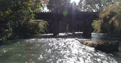 Under a bridge - River Stock Footage 124859030