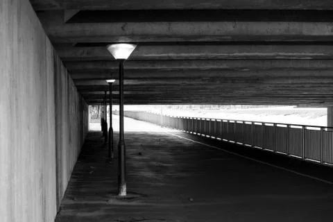 Under the bridge tunnel with light post Stock Photos
