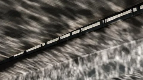 Under a bridge with water reflection Stock Photos