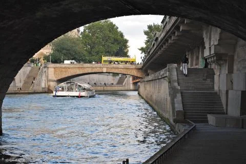 Under the bridge on the waterfront. Stock Photos