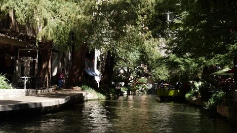 Under Canopy of Trees at The River Walk Slow Motion San Antonio Stock Footage 83121368