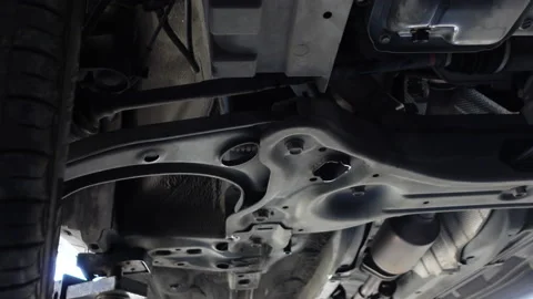 Under the car below part for auto repair car frame Stock Footage 154208607