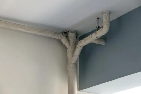 Under ceiling sewer pipes or drain pipes system in modern building Stock Photos