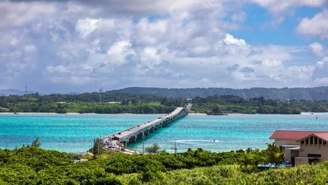 Under a clear blue sky, you can see the Kouri Bridge in Okinawa from a high.. Stock Photos