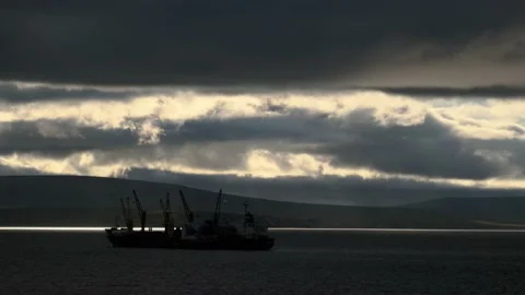 Under the cloudy sky in the sea there are ships. Stock Footage 142767007