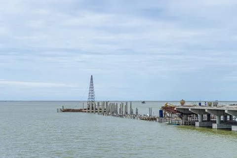 Under construction of a bridge in the sea Stock Photos