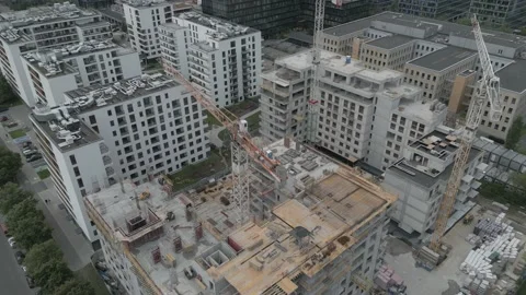 Under construction building with cranes not color graded Video stock 202615135