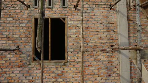 Under-Construction Building with Exposed Brick Walls Stock Photos