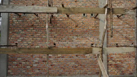 Under-Construction Building with Exposed Brick Walls Stock Photos