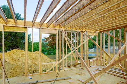 Under construction home framing interior view of house Stock Photos