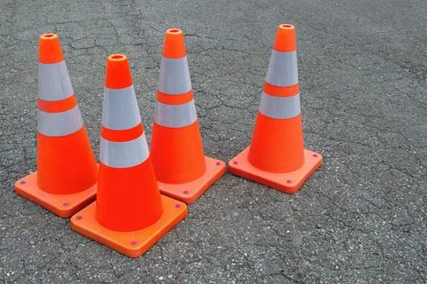 Under construction orange traffic cones asphalt road web site Stock Photos
