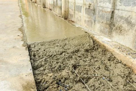 Under construction road with fresh cement Stock Photos
