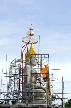 Under construction of seated buddha image in attitude of subduing mara Stock Photos