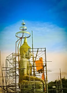 Under construction of seated buddha image in attitude of subduing mara Stock Photos