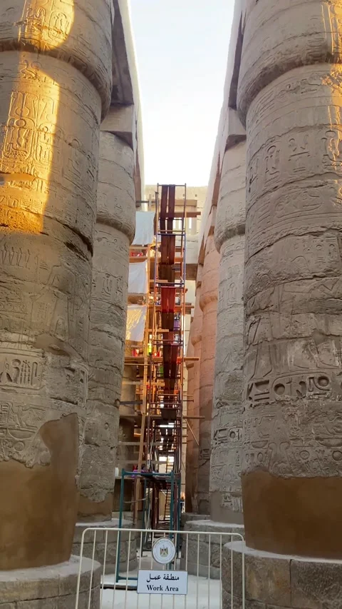 Under construction site in egypt temple with hieroglyphs in the columns Stock Footage 232136261