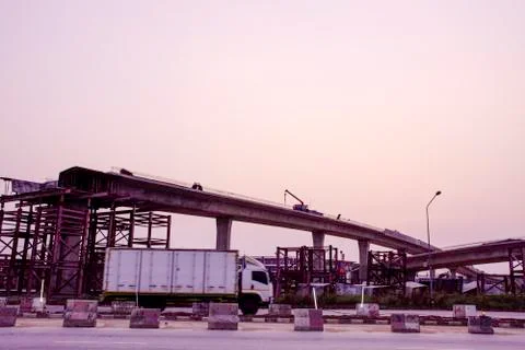 Under Construction site of road bridge with sunset sky clouds, improvement of Stock Photos