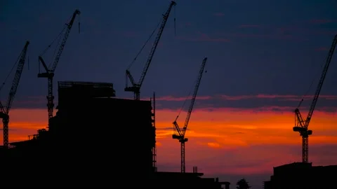 Under Construstion Concept: Construction Site with Big Tower Crane in Silhouette Stock Footage 238406004