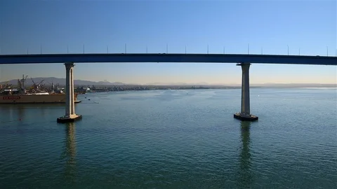 Under Coronado Bridge Aerial Stock Footage 99125655